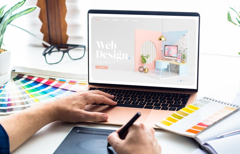 designing a website on a laptop computer
