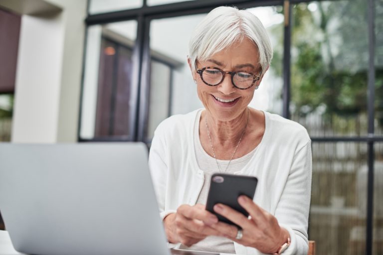 Women using her mobile phone.